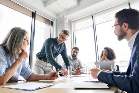 Businesspeople working on a business systems integration plan.